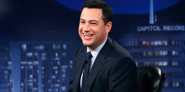 This July 25, 2012 photo released by ABC shows Jimmy Kimmel hosting his late night show "Jimmy Kimmel Live," in the Hollywood section of Los Angeles.