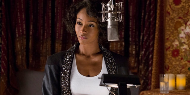 In this image released by Lifetime, Yaya DaCosta stars as Whitney Houston in the Lifetime Original Movie, "Whitney," premiering Saturday, Jan. 17, 2015 at 8pm ET/PT on Lifetime. (AP Photo/Lifetime, Jack Zeman)