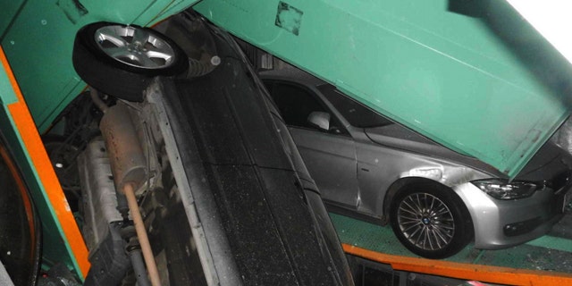 April 20, 2015: In a photo provided by the Taipei Fire Department, vehicles are seen piled on themselves in an automated parking tower after the lift system failed during the 6.3 magnitude earthquake that struck off the island's eastern coast. (Taipei Fire Department via AP)