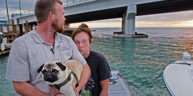 A Colorado couple who dreamed of a life sailing around the world had the wind taken out of their sails when their boat capsized nearly two days into their trip.