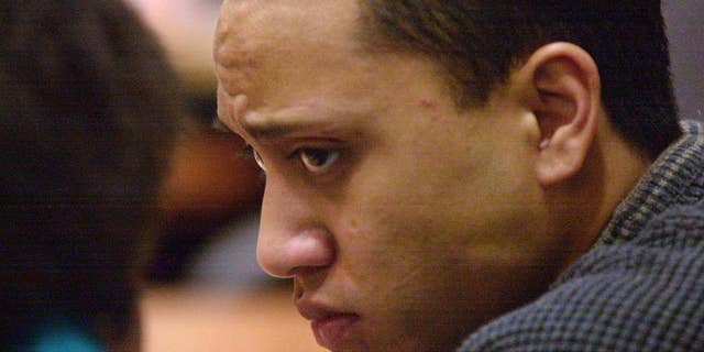 In this photo from March 2002, Vili Fualaau watches as his lawyer speaks during opening arguments in a $1 million lawsuit in Kent, Washington.