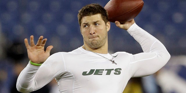 Dec. 17, 2012: In this file photo, then-New York Jets quarterback Tim Tebow warms up before an NFL football game in Nashville, Tenn.