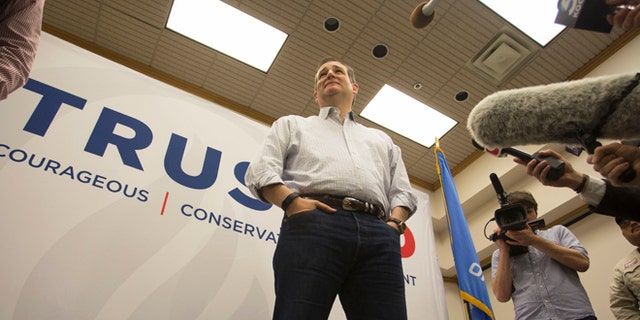 FILE - In this Dec. 23, 2015 file photo, Republican presidential candidate Sen. Ted Cruz, R-Texas speaks with the media before a campaign stop in Oklahoma City. When Ted Cruz first ran for U.S. Senate in Texas, the only thing lower than his name ID were expectations heâd win. Then the state solicitor general, Cruz amassed a coalition anchored by tea party conservatives and evangelicals on his way to defeating a sitting lieutenant governor who entered the primary with the financial and organizational muscle of the GOP establishment. (AP Photo/J Pat Carter, File)