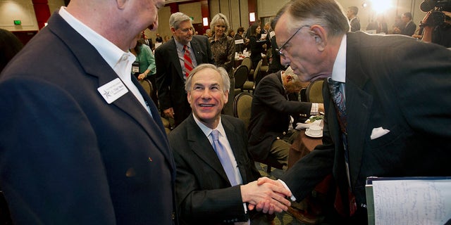 Texas AG Greg Abbott, Republican candidate for Governor, greets supporters on Jan. 10, 2014 in Austin, Texas.