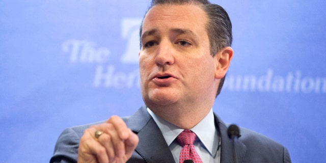 FILE - In this Dec. 10, 2015 file photo, Republican presidential candidate Sen. Ted Cruz, R-Texas speaks in Washington. Donald Trump will be standing at center stage, but Cruz will be in the spotlight during Tuesdayâs Republican presidential debate. The Texas senator is challenging Trumpâs lead in Iowa, and has the money, campaign infrastructure and conservative appeal to compete deep into the GOP primary season. (AP Photo/Pablo Martinez Monsivais, File)