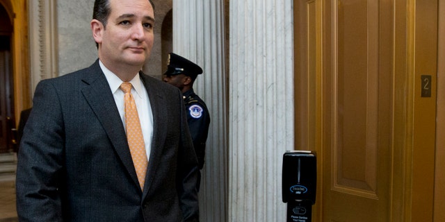 Sen. Ted Cruz, R-TX., leaves the Senate floor on Capitol Hill in Washington, Friday, Dec. 20, 2013. In its last hours before Congress shuts down for the year, the Senate is voting on several nominations. (AP Photo/Manuel Balce Ceneta)
