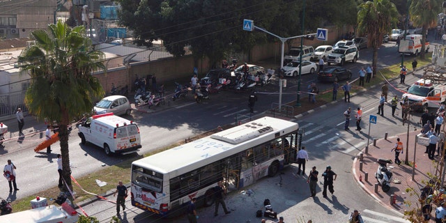 Nov. 21, 2012: A destroyed bus is seen at the site of a bombing in Tel Aviv, Israel.