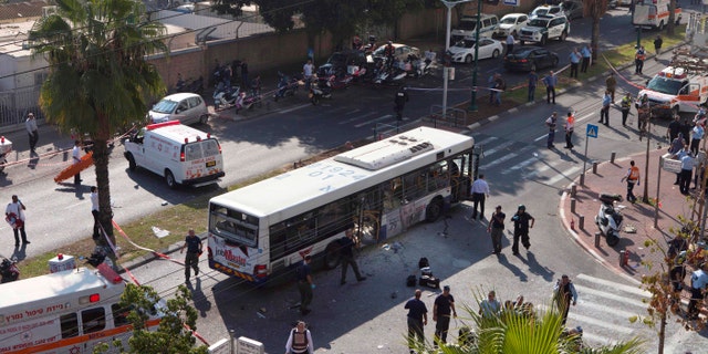 Nov. 21, 2012: A destroyed bus is seen at the site of a bombing in Tel Aviv, Israel.