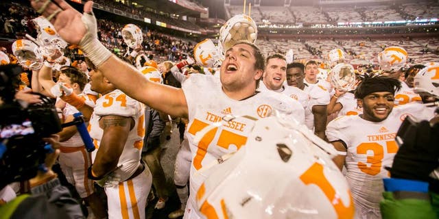 Nov 1, 2014; Columbia, SC, USA; Tennessee Volunteers offensive lineman Kyler Kerbyson (77) sings Rocky Top following their overtime win over the South Carolina Gamecocks at Williams-Brice Stadium. Mandatory Credit: Jeff Blake-USA TODAY Sports