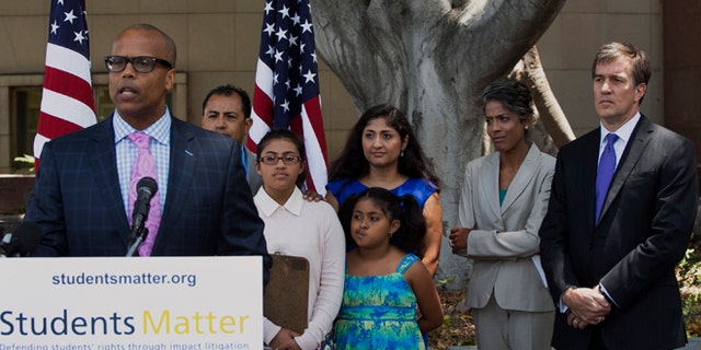 Tuesday, June 10, 2014: A judge struck down tenure and other job protections for California's public school teachers as unconstitutional Tuesday, saying such laws harm students.The lawsuit was backed by wealthy Silicon Valley entrepreneur David Welch (far right) which assembled a high-profile legal team.