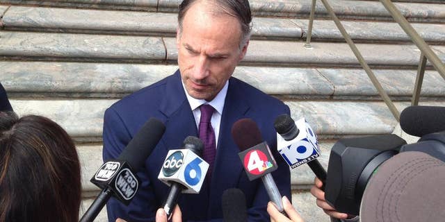 Sam Shamansky, defense attorney for accused terrorist Abdirahman Sheik Mohamud, answers questions after Mohamud entered not guilty pleas in federal court to charges of supporting terrorism, supporting a terrorist group and making a false statement involving international terrorism, on Friday, April 17, 2015, in Columbus, Ohio. Mohamud was arrested in Columbus in February on state terrorism and money laundering counts. (AP Photo/Andrew Welsh-Huggins)
