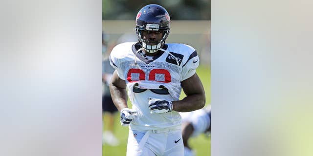 FILE - In this Aug. 20, 2014, file photo, Houston Texans linebacker Jadeveon Clowney runs a drill during a joint practice between the Denver Broncos and the Texans in Englewood, Colo. Top overall pick Jadeveon Clowney will have a second knee surgery, ending his season for the Houston Texans, Thursday, Dec. 4, 2014. (AP Photo/Jack Dempsey, File)