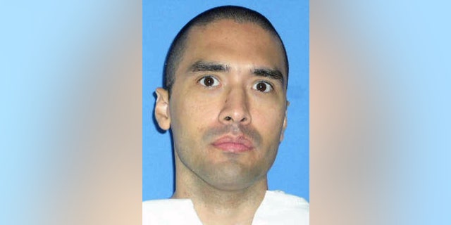 This photo released by the Texas Department of Criminal Justice shows death row inmate Rolando Ruiz. The convicted hit man scheduled to be put to death Wednesday, Aug. 31, 2016 for a murder-for-hire plot that left a woman dead more than 23 years ago has received a reprieve from a state appeals court _ the second he has received within a week of an execution date. (Texas Department of Criminal Justice via AP)