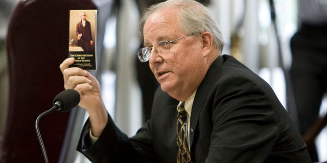 Sept. 24, 2010: Texas State Board of Education member David Bradley challenges Brian Spears of Americans United for the Separation of Church and State to find the phrase "separation of church and state" in the U.S. Constitution during a meeting of the board to discuss Islam and Christianity in textbooks in Austin, Texas.