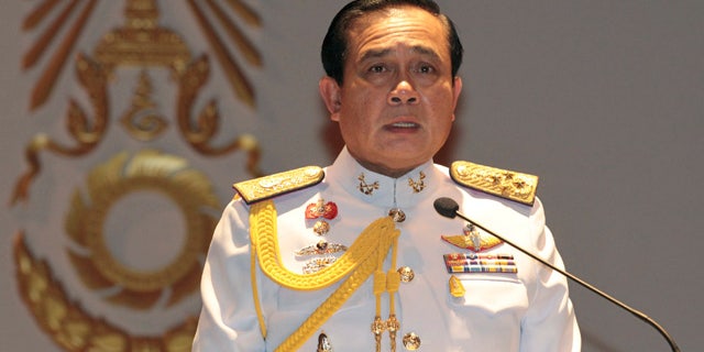 FILE - In this Monday, May 26, 2014 file photo, Gen. Prayuth Chan-ocha speaks at the start of a press conference. (AP Photo/Sakchai Lalit, File)