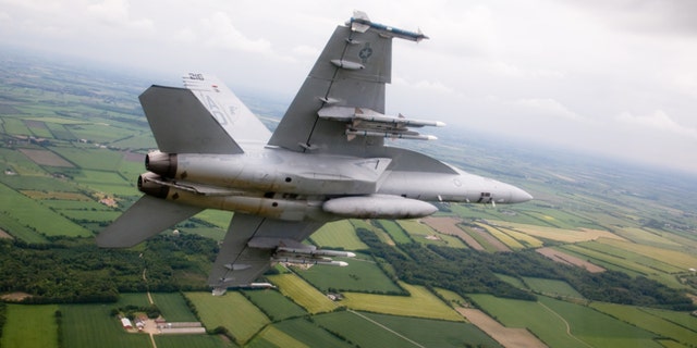 A Boeing Super Hornet in transit to Denmark in 2009, flying with the Royal Danish Air Force.