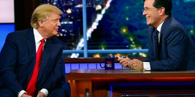 Sept. 22, 2015: In this photo provided by CBS, Republican presidential candidate Donald Trump, left, joins host Stephen Colbert on the set of 'The Late Show with Stephen Colbert' in New York. (John Paul Filo/CBS via AP)