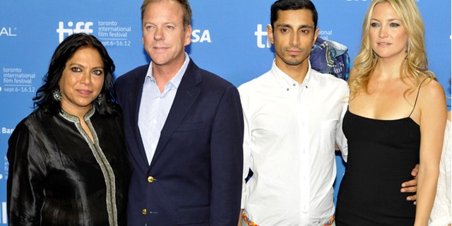 Director Mira Nair, left, poses with cast members (from left) Kiefer Sutherland, Riz Ahmed and Kate Hudson at a news conference for their film "The Reluctant Fundamentalist" at the 37th Toronto International Film Festival September 9, 2012.