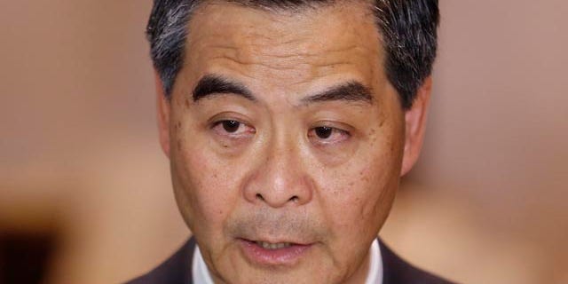 October 15, 2014: Hong Kong Chief Executive Leung Chun-ying speaks to the media after a presentation ceremony in Hong Kong. (AP Photo/Kin Cheung)
