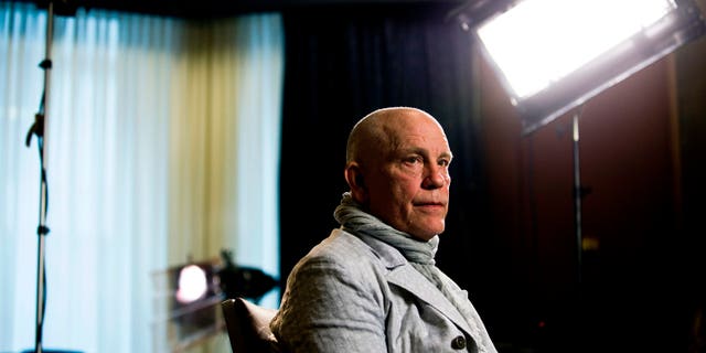 Actor John Malkovich speaks with media at the King Edward Hotel in Toronto to promote his new role as Casanova in The Giacomo Variations, on Thursday, June 6, 2013. The show runs June 7-9. (AP Photo/The Canadian Press, Galit Rodan)