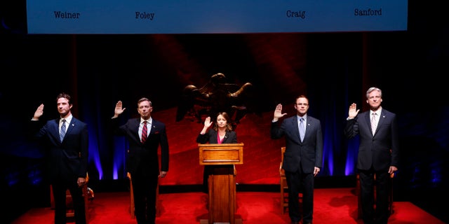 This 2014 photo provided by Richard Kornberg & Associates shows, from left, Nate Smith, Arnie Burton, Rachel Dratch, Sean Dugan, and Tom Galantich in a scene from "Tail! Spin!" at the Culture Project in New York. The show closes Jan. 4, 2015. (AP Photo/Richard Kornberg & Associates, Carol Rosegg)