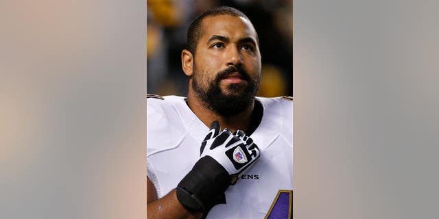 Baltimore Ravens guard John Urschel (64) before an NFL football game against the Pittsburgh Steelers, Sunday, Nov. 2, 2014, in Pittsburgh.