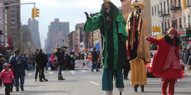 Revelers march during the Three Kings Day Parade in East Harlem on January 4, 2013 in New York City.