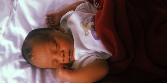 She said she watched YouTube clips on how to deliver a baby before giving birth by herself in her hotel room.