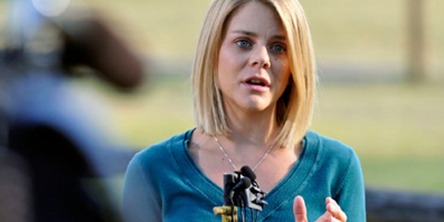 Oct. 8, 2012: Tiffany Hartley speaks at a news conference at her family farm in La Salle, Colo.