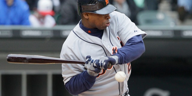 April 14, 2012: Detroit Tigers' Delmon Young is hit by a pitch from Chicago White Sox starter Gavin Floyd during the second inning of an baseball game in Chicago. (AP)