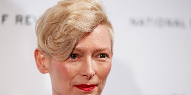 Actress Tilda Swinton arrives to accept the Best Actress award at the National Board of Review Awards Gala in New York January 10, 2012.