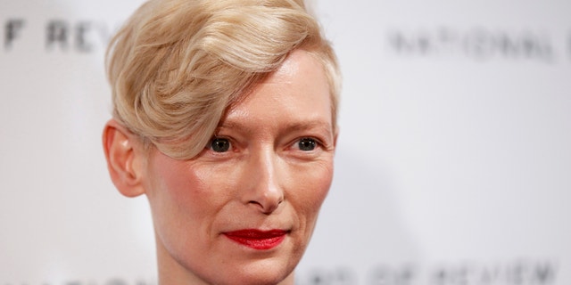 Actress Tilda Swinton arrives to accept the Best Actress award at the National Board of Review Awards Gala in New York January 10, 2012.