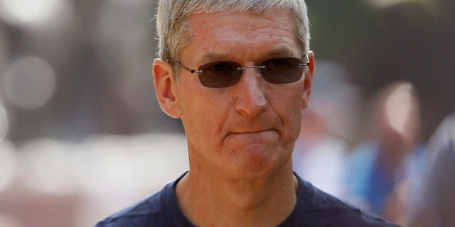 July 9: Apple Inc. CEO Tim Cook walks down a sidewalk during a break on the first day of the Allen and Co. media conference in Sun Valley.