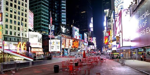 May 1: Times Square is void of pedestrians just south of 46th Street in New York.