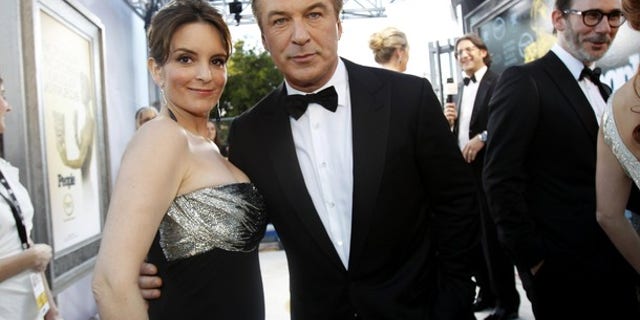Actors Tina Fey (L) and Alec Baldwin, from the television series "30 Rock" at the Screen Actor's Guild Awards in January. The show will come to an end after its seventh season.