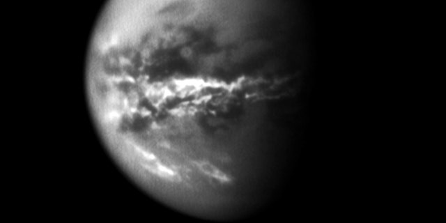 NASAs Cassini spacecraft chronicled the change of seasons as it captured clouds concentrated near the equator of Saturns largest moon, Titan, on Oct. 18, 2010.