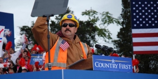 Tito "the builder" Muñoz speaks at a McCain rally.