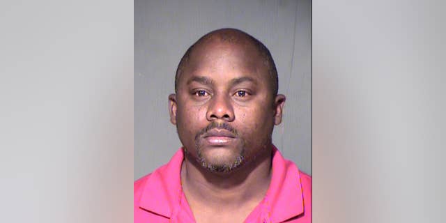 This undated booking photo provided by the Maricopa County Sheriff shows James Koryor, 41, who was arrested on manslaughter and child abuse charges after police said he left his toddler son in a hot car during a day of heavy drinking in the southwestern city of Phoenix.Koryor made an initial court appearance Tuesday, April 21, where a judge set a $50,000 bond and assigned the case to the public defender's office. Prosecutors argued for higher bail, saying Koryor has extensive ties to Liberia, Ivory Coast and Ghana and could flee. (Maricopa County Sheriff via AP)