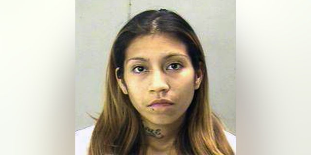 undated FILE photo from Dallas Co Sheriff's Dept of Elizabeth Escalona who admitted to gluing her daughter's hands to a wall.