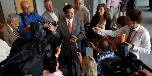 FILE: Former U.S. House Majority Leader Tom DeLay speaks to the media during a break at his pre-trial hearing on Aug. 24.