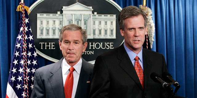Newly named White House press secretary Tony Snow (R) speaks after being introduced by U.S. President George W. Bush in the briefing room in Washington April 26, 2006. Snow, a Fox News Radio host, replaced Scott McClellan who announced his resignation last week as part of a staff shake-up engineered by new White House Chief of Staff Josh Bolten aimed at reviving Bush's presidency.   REUTERS/Jim Young - GM1DSLXXZSAA