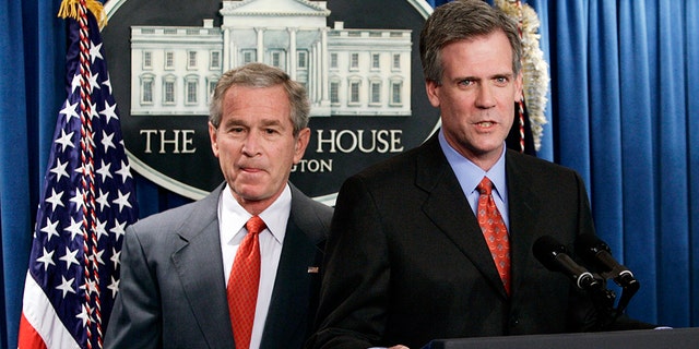 Newly named White House press secretary Tony Snow (R) speaks after being introduced by U.S. President George W. Bush in the briefing room in Washington April 26, 2006. Snow, a Fox News Radio host, replaced Scott McClellan who announced his resignation last week as part of a staff shake-up engineered by new White House Chief of Staff Josh Bolten aimed at reviving Bush's presidency. REUTERS/Jim Young - GM1DSLXXZSAA