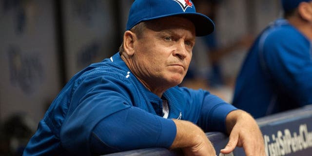 Apr 25, 2015; St. Petersburg, FL, USA; Toronto Blue Jays manager John Gibbons (5) in the dugout during the first inning against the Tampa Bay Rays at Tropicana Field. Mandatory Credit: Jeff Griffith-USA TODAY Sports