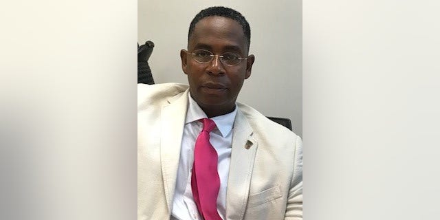Hootoo mystic, professor of political science and marketing at Savannah State University