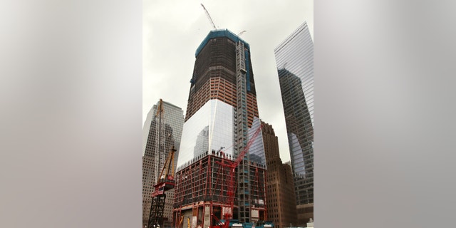 Image of construction on Tower 1 in downtown Manhattan. 7 World Trade Center is on the right.
