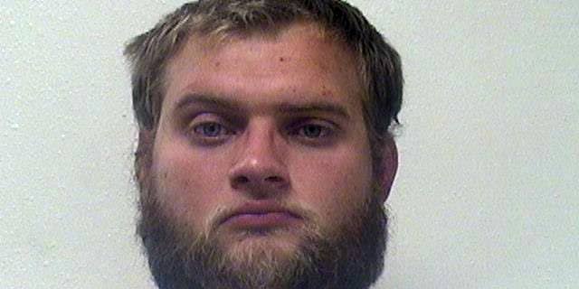 This photo provided by the Campbell County Sheriff's Office shows Derek Skyler Brux, who pleaded guilty to a federal charge in connection with taking two locomotives from a coal mine and crashing them into another train last fall. He faces sentencing Friday, April 10, 2015. (AP Photo/Campbell County Sheriff's Office)