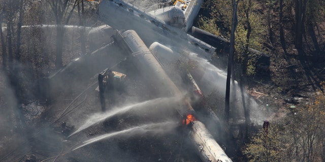 Oct. 31, 2012: Flames can be seen from the air after an explosion happened at the sight of a train derailment in southern Jefferson County, just south of Louisville, Ky.