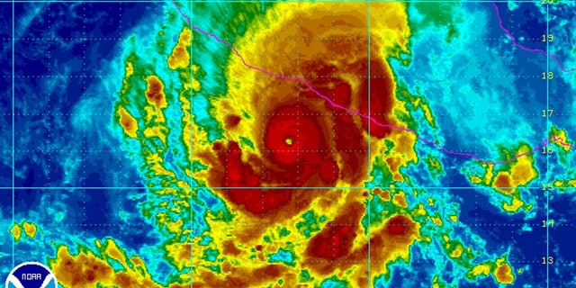 Oct. 21, 2013 - Satellite image shows Hurricane Raymond in the Pacific Ocean off the coast of Mexico. Raymond strengthened to a Category 3 storm early Monday, and threatened to hurl heavy new rains onto a sodden region of Mexico's Pacific Coast already devastated by last month's Tropical Storm Manuel. (photo provided by National Oceanic and Atmospheric Administration