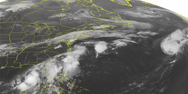 This NOAA satellite image taken Thursday, September 01, 2016 at 12:45 AM EDT shows large amounts of thunderstorm activity occurring offshore of the southeastern United States, extending offshore of the Mid-Atlantic. Tropical Storm Hermine is also observed in the southeastern Gulf of Mexico, slowly marching northward towards the Gulf shore. Some isolated rain showers are also moving ahead of a cold front draped across New England and into the Mid-west. (NOAA/Weather Underground via AP)
