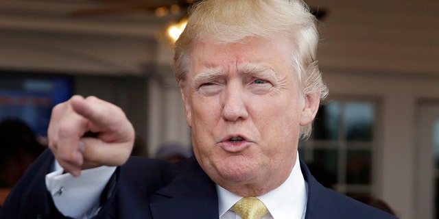 FILE - In this July 6, 2015, file photo, Republican presidential candidate Donald Trump arrives to a fundraising event at a golf course in the Bronx borough of New York. Trump is drawing larger crowds as he continues to criticize immigration policies in stark language that has revealed a deep divide between immigration hawks and moderates who are trying to avoid alienating Hispanic voters. (AP Photo/Seth Wenig, File)